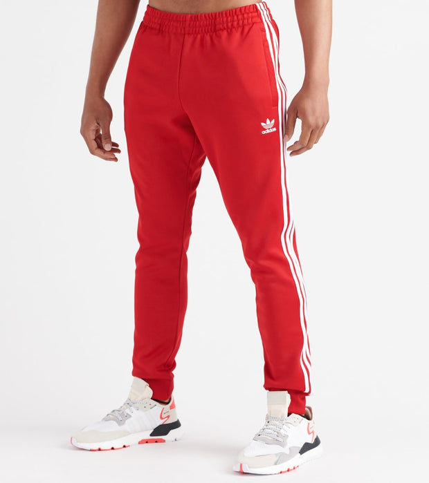 red adidas sst track pants