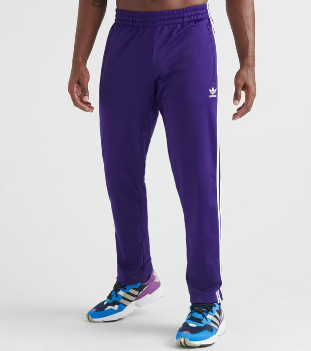 purple adidas track pants