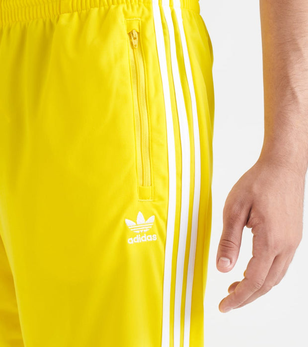 yellow adidas tracksuit bottoms