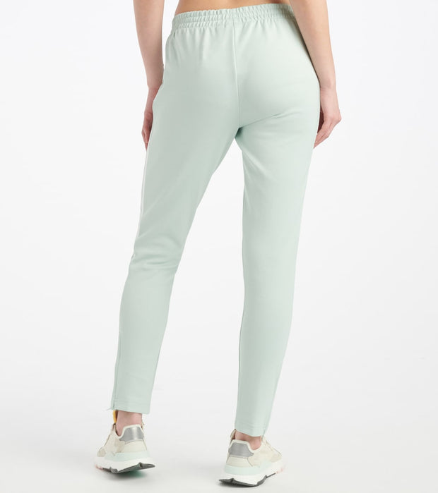 mint green adidas track pants