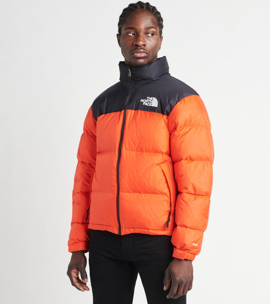 north face orange and black jacket