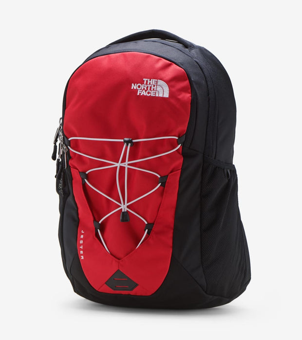 red black and white north face backpack