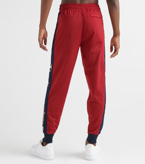 champion black and red taping track pants