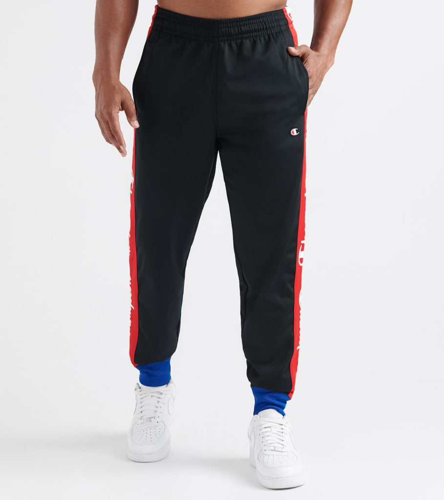 champion black and red taping track pants