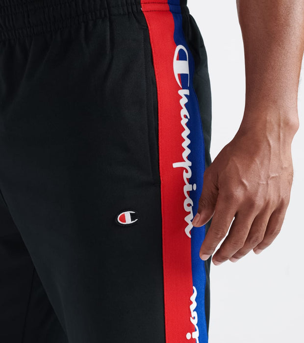 champion black and red taping track pants