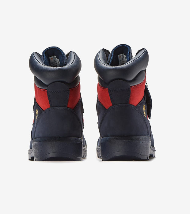 navy blue and red timberland field boots