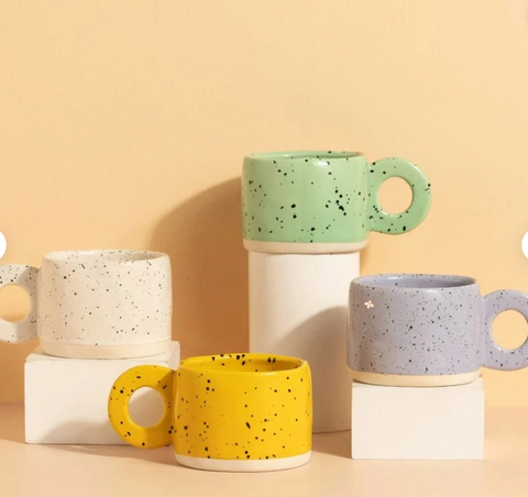 Handmade mugs in bright colours