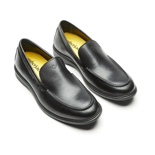 A pair of Obsidian loafer dress shoes