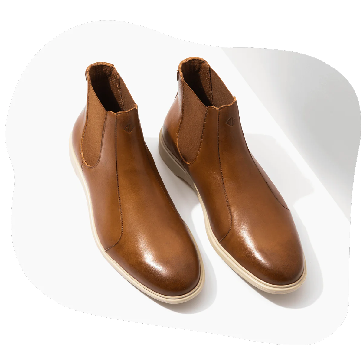 Men's leather Chelsea boots in honey and cream colors