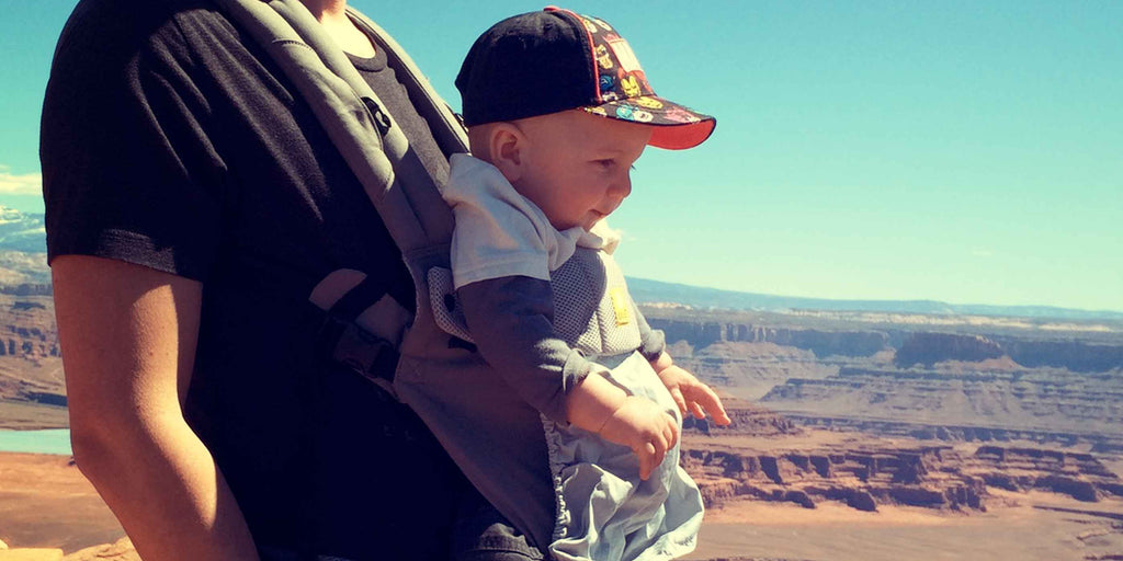 dad taking his baby on an adventure in the outdoors