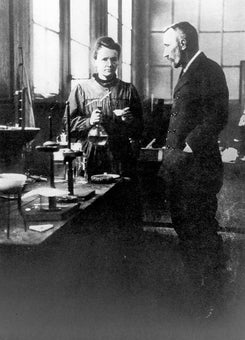 Pierre and Marie Currie in their lab