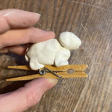 Homeschool science craft project making lamb ornament of clay and clothespin base