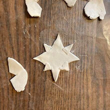 Homeschool science craft project making star shaped ornament of clay