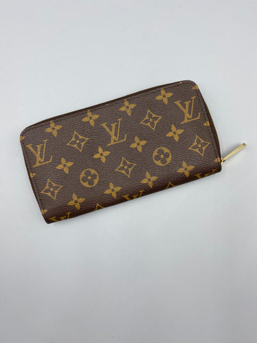 Louis Vuitton Zippy wallet monogram with poppy red – Erin's Online Wardrobe