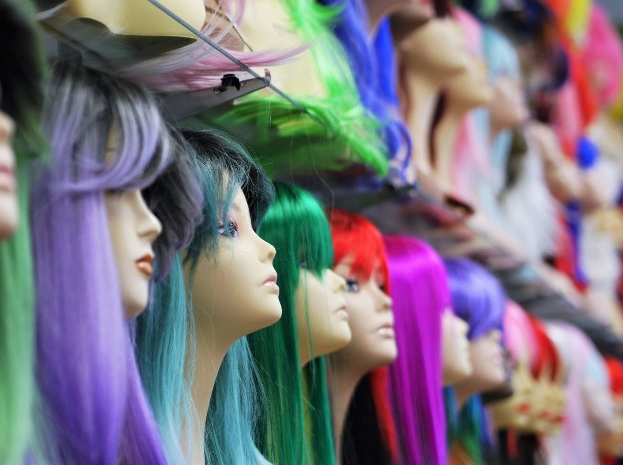 close up shot of display for fun costume party wigs at wig ave