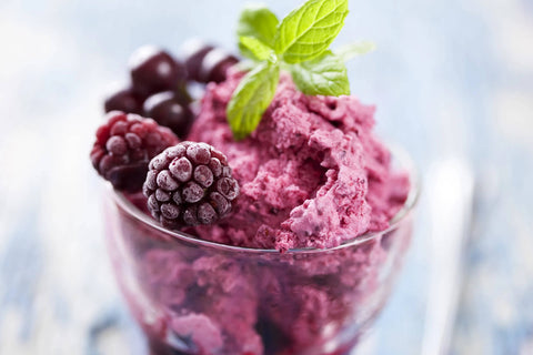 Blackberry sorbet with mint garnish