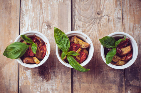 Potatoes with basil garnish