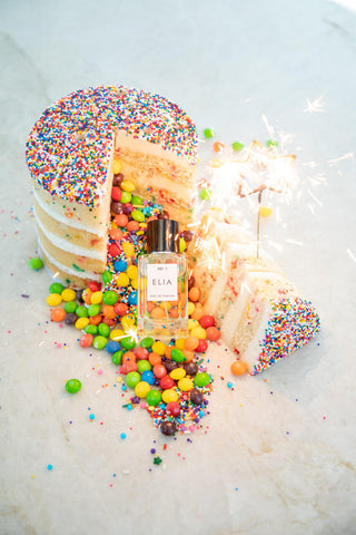 birthday perfume with a cake and sparklers