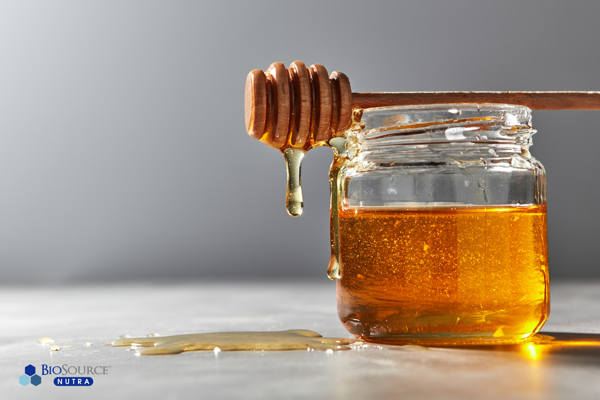A glass jar of honey