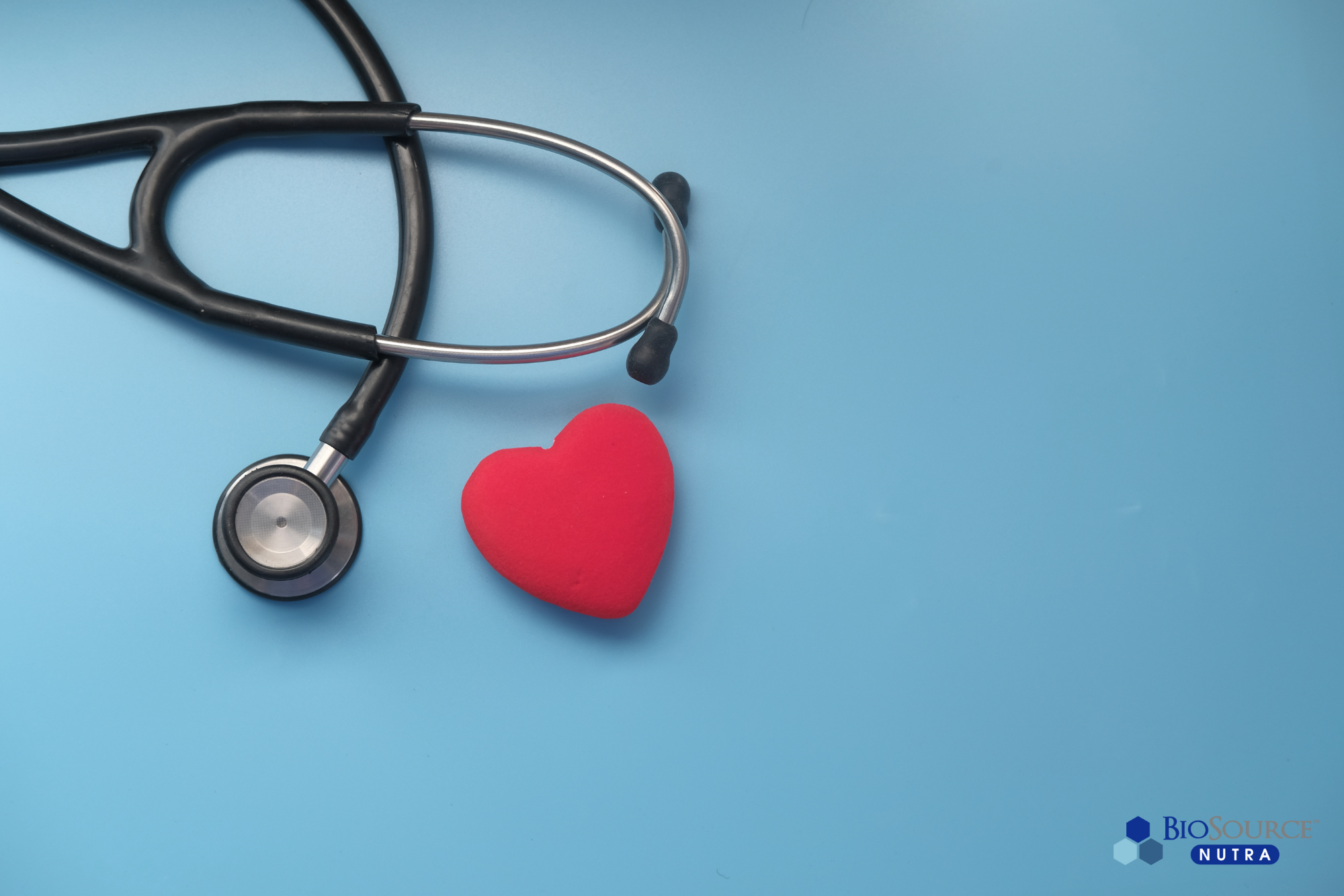 A stethoscope and a red heart