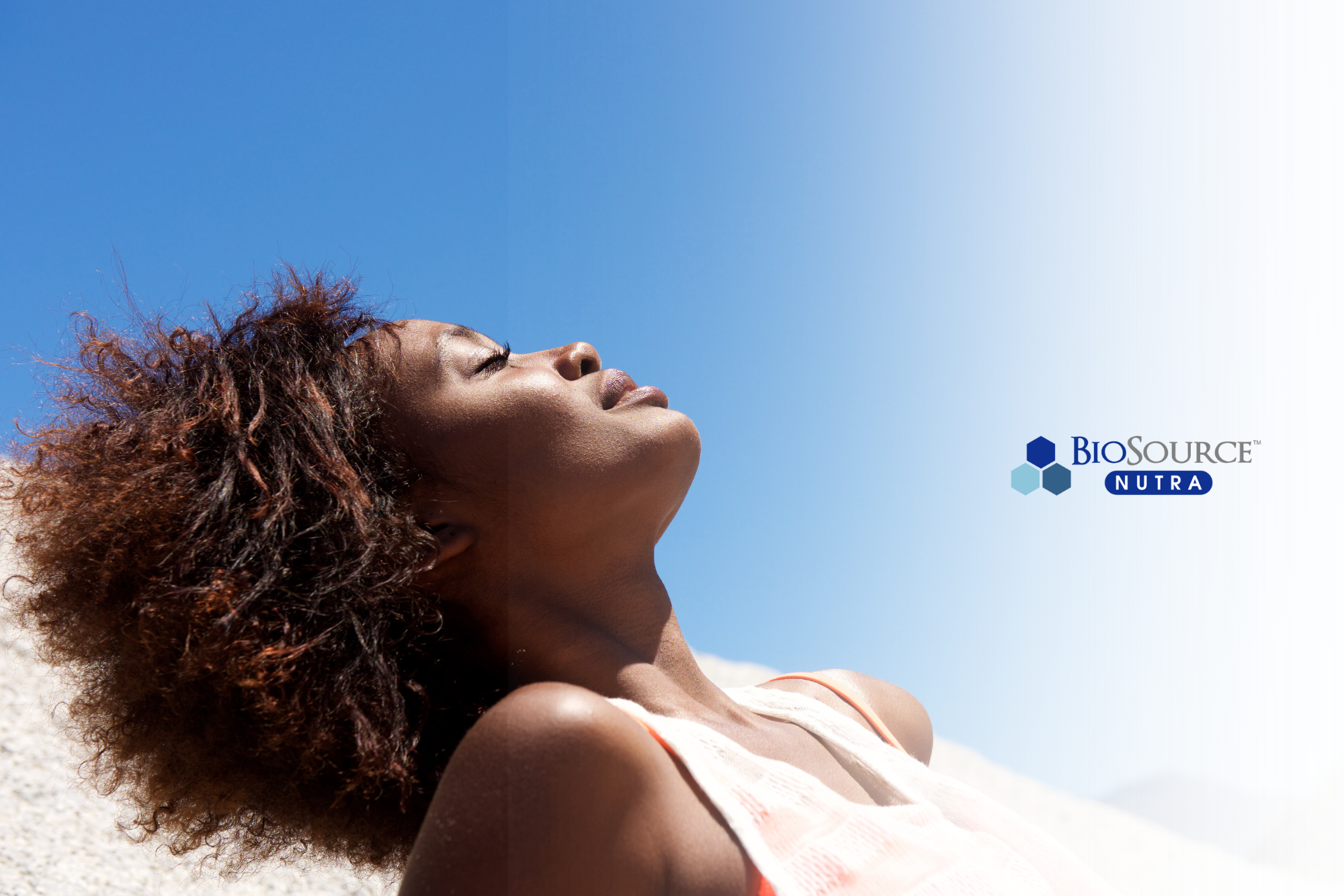 A young woman soaks up the sun