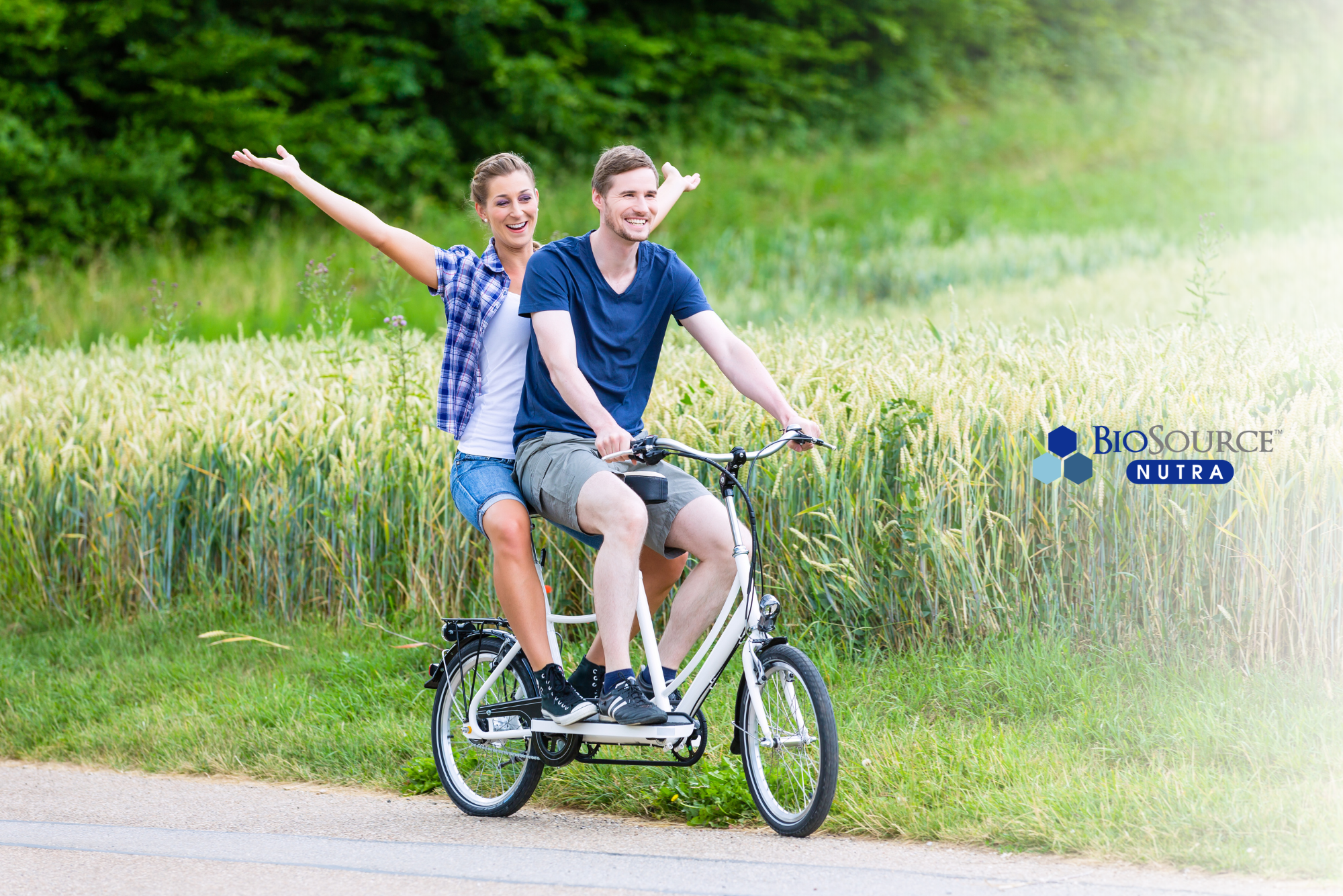 A young couple enjoys a bike ride