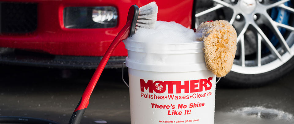 bucket with cleaning accessories