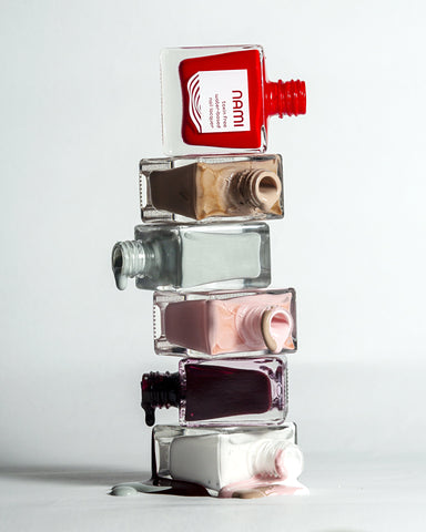 A stack of Nami nail polishes