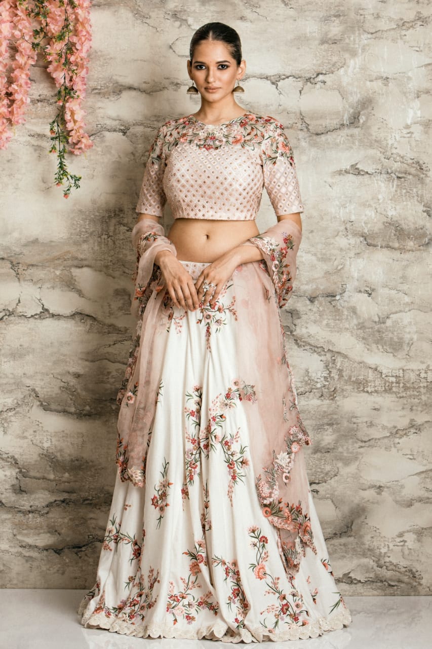 Kafoori ivory Banarasi cotton silk lehenga with peplum blouse and tiss