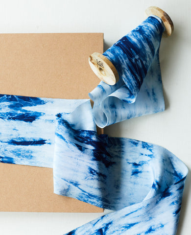 Shibori indigo silk ribbon wrapped around a package