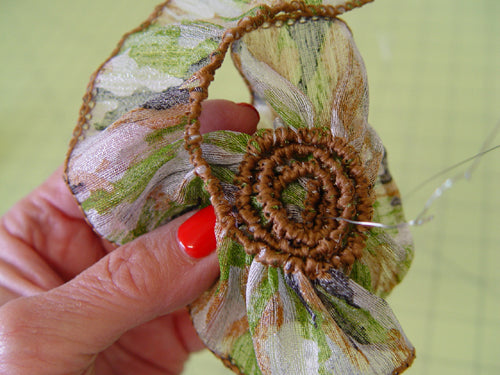 camo-flower-candle-wrapper-roll-ribbon-around