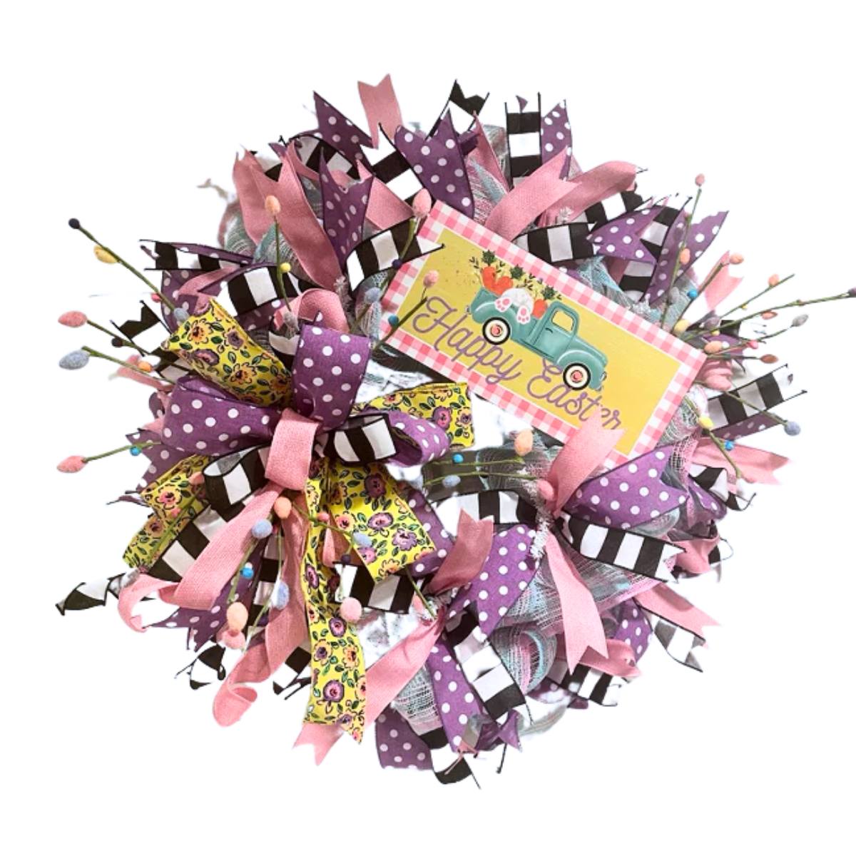 easter wreath made with deco mesh, easter egg picks, sign and ribbon