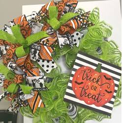 halloween wreath with trick or treat sign