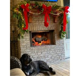 fresh magnolia and cypress garland for back porch mantel