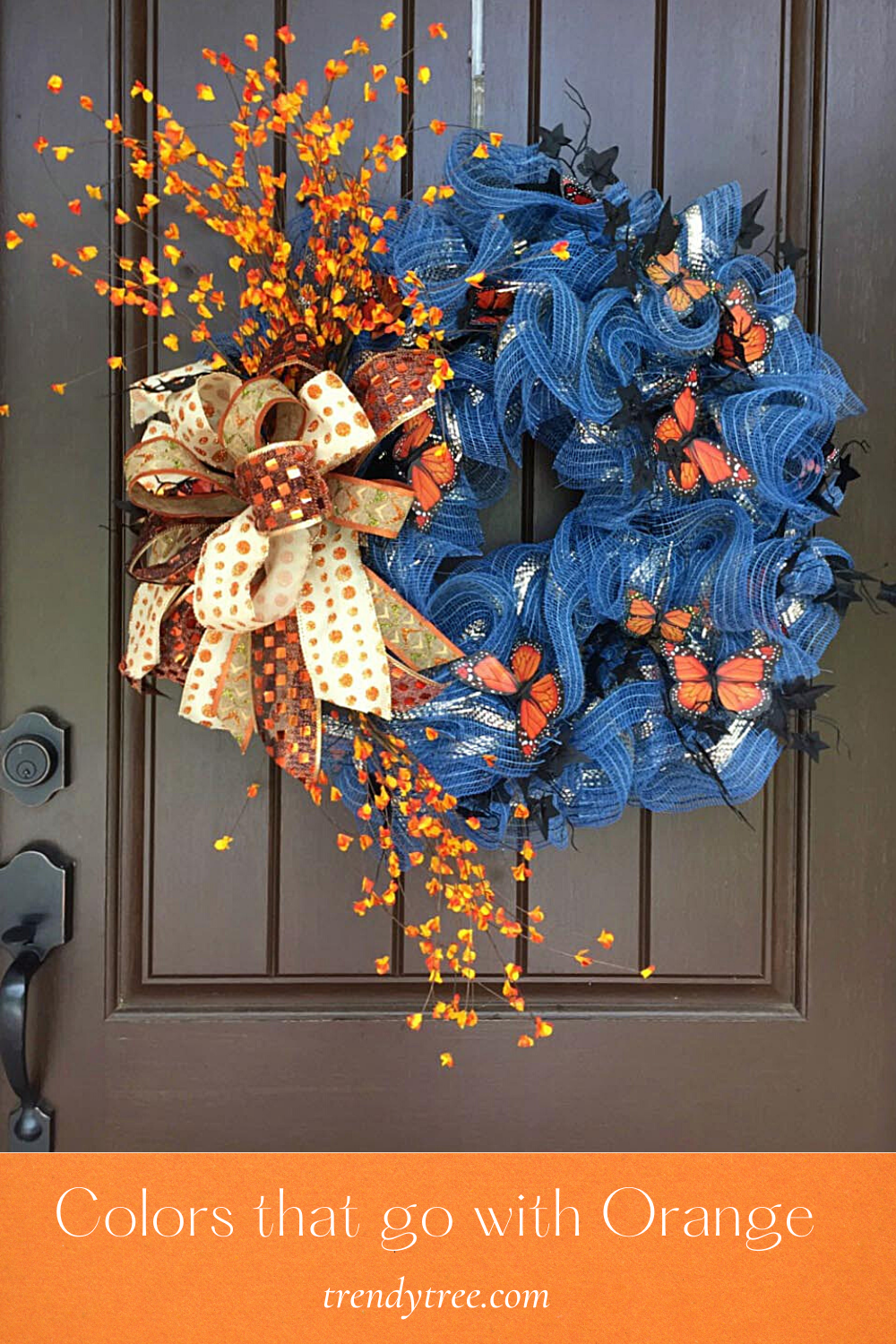 denim wreath with orange bittersweet and butterflies