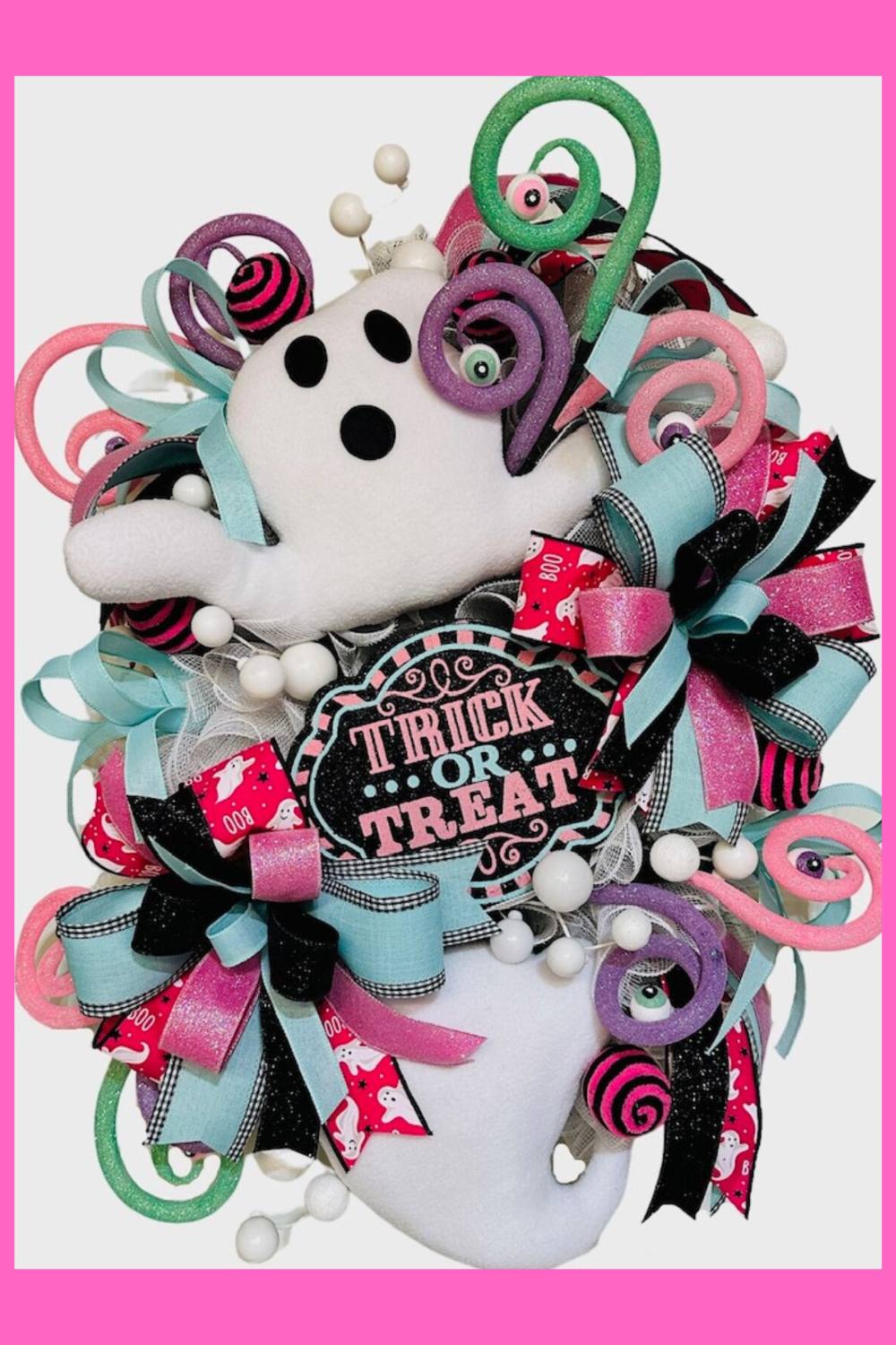 Halloween wreath with adorable ghost and pink trims