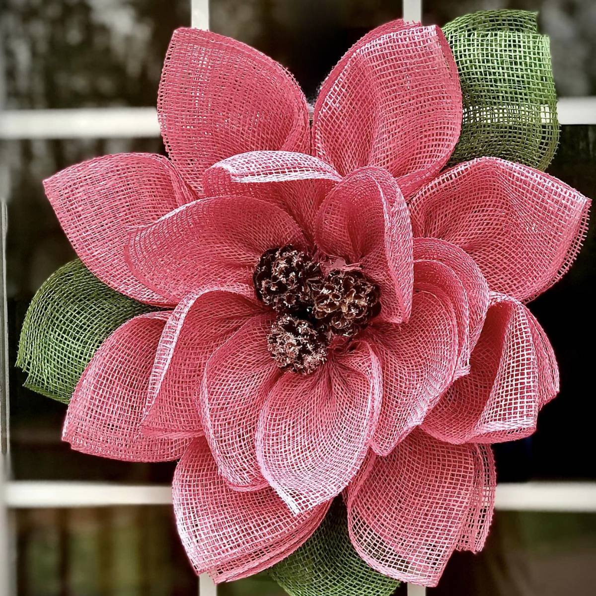 pink magnolia wreath made with poly burlap