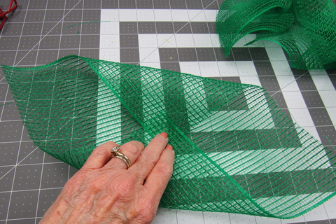 fold 10" square mesh into petal shape