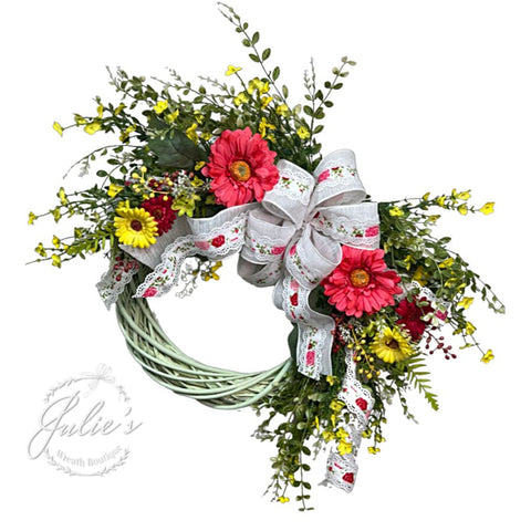 spring floral wreath on light green vine form