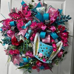 whimsical easter wreath with bunny ear top hat