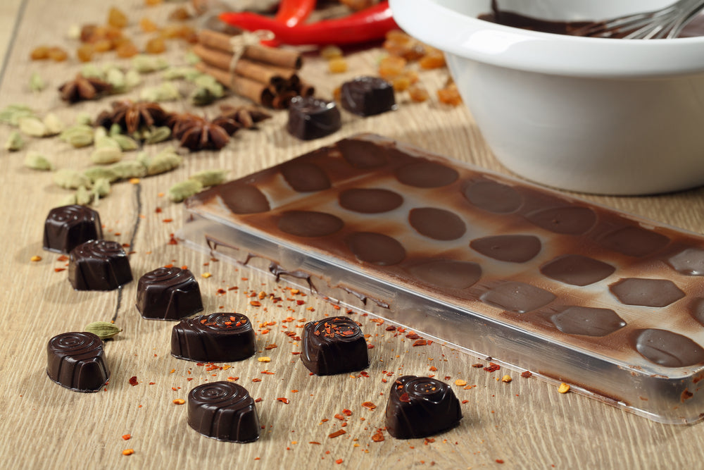 Close-up of homemade CBD chocolates in a mould