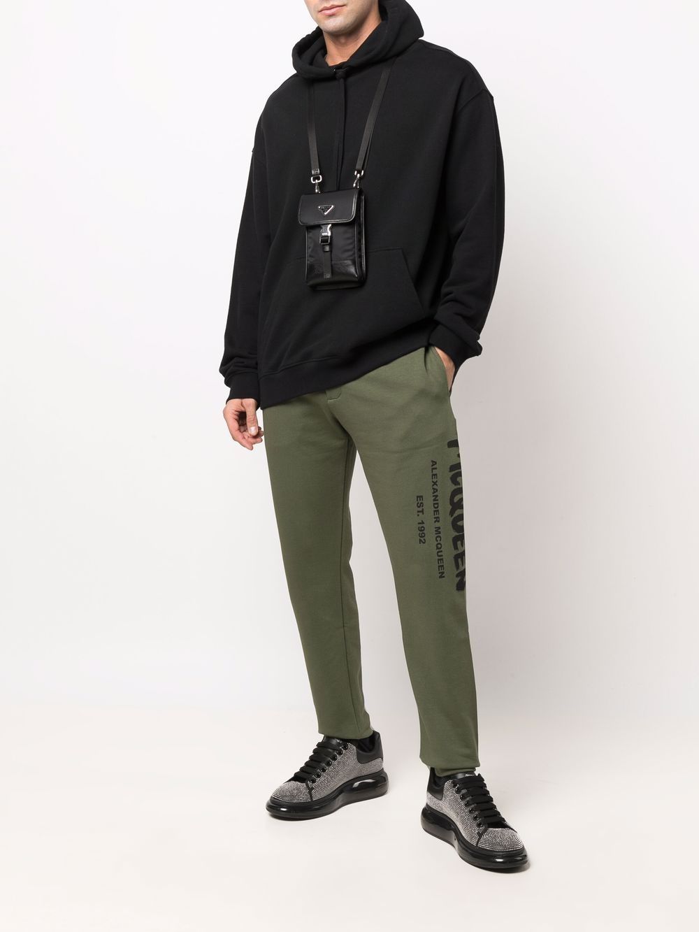 Shop Alexander Mcqueen Logo Print Tapered Track Trousers