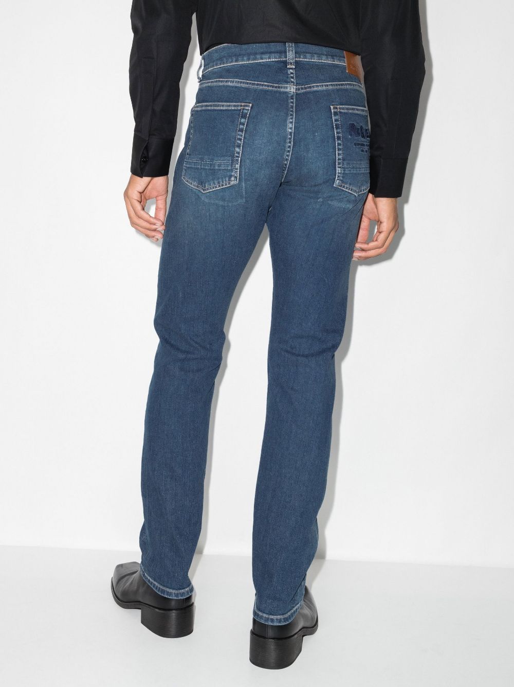 Shop Alexander Mcqueen Embroidered-logo Straight-leg Jeans