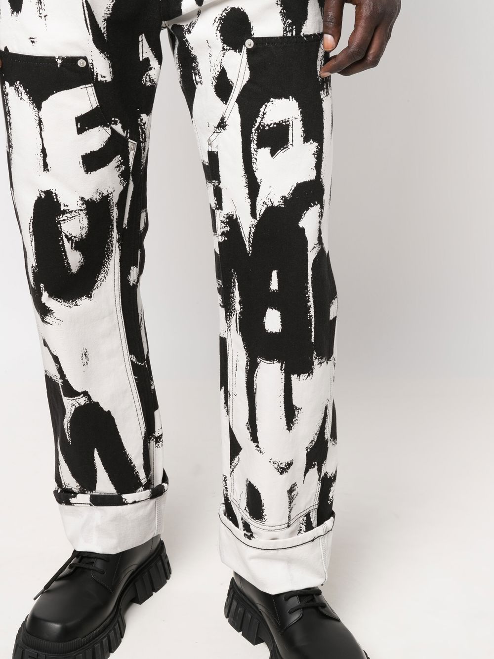 Shop Alexander Mcqueen Graffiti-print Straight-leg Jeans