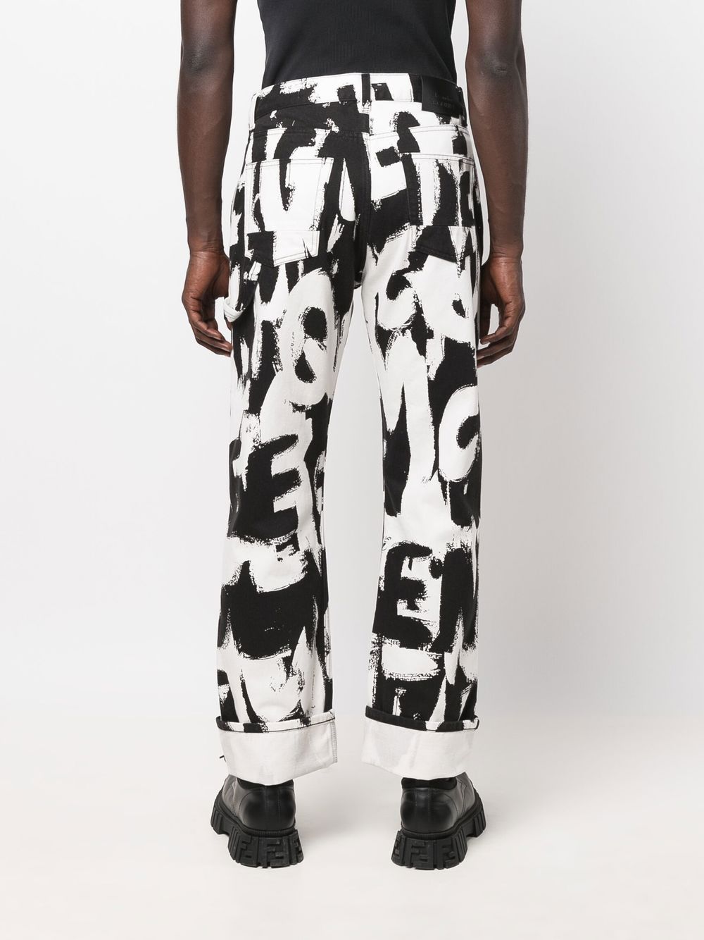 Shop Alexander Mcqueen Graffiti-print Straight-leg Jeans