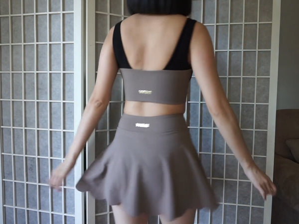 Elifestyle is showing you the back of HIGH-WAIST A-LINE TENNIS SKIRT