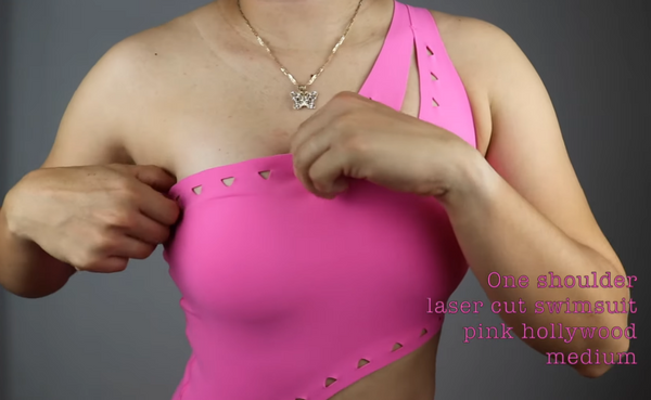 Julissa Pacheco shows off the laser-cut details of a pink shoulder