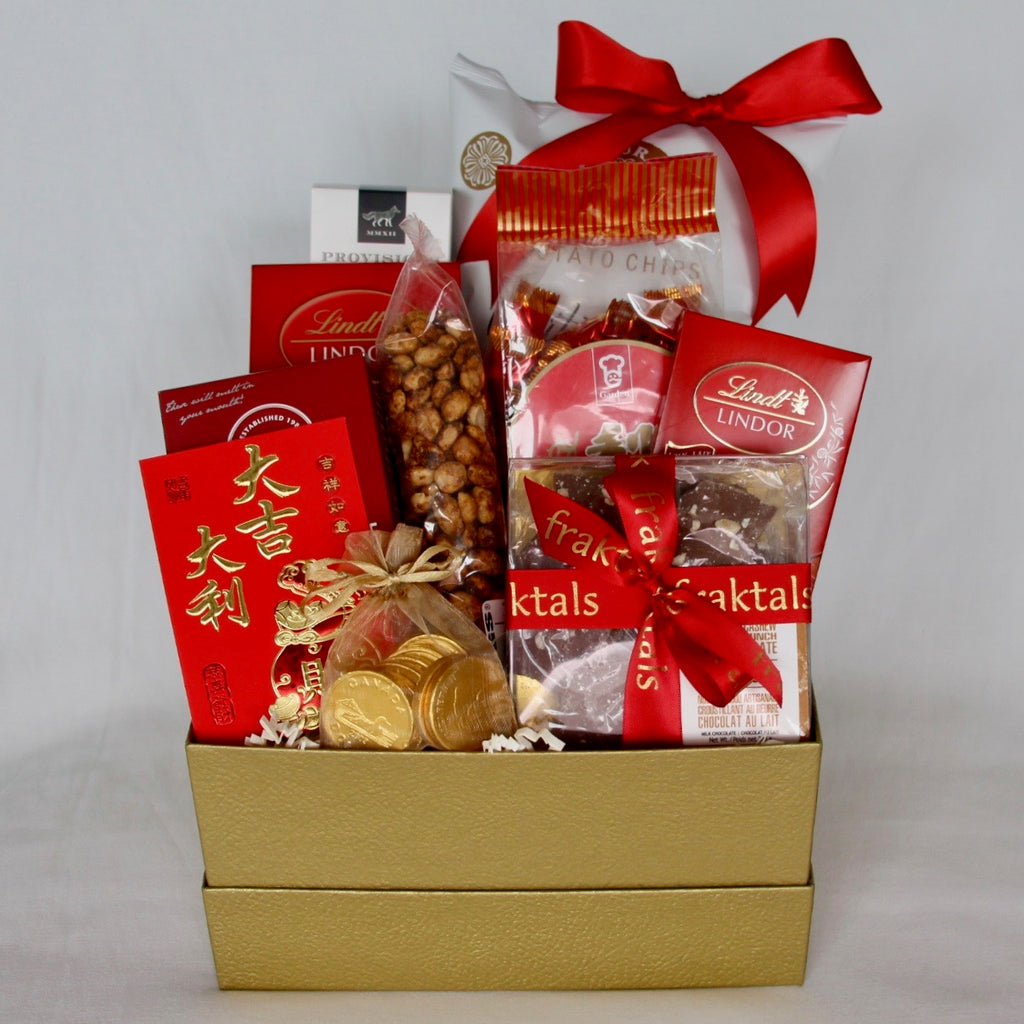 Celebrate the Year of the Tiger with this beautiful gift basket featuring the best sweets and snacks. A wonderful gift to send to friends, family, employees or clients to wish them prosperity and all the best in the new year.