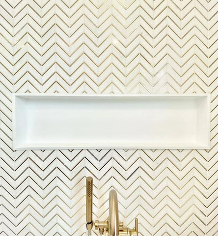 1- brass tiles bathroom