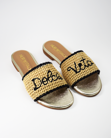 summer capsule essentials flat sandals with raffia on the upper and text Dolce Vita